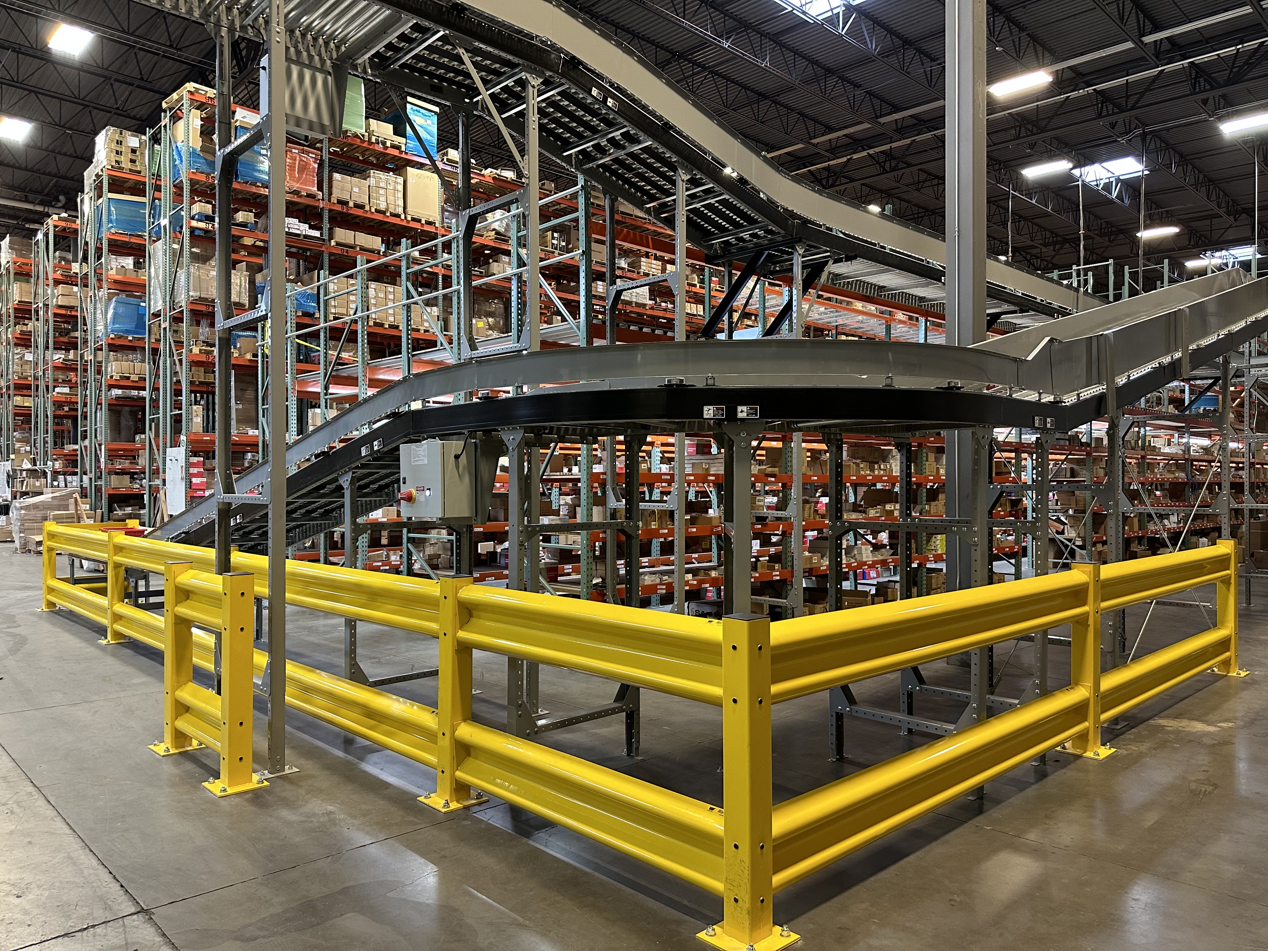 A power conveyor that can transport items between different heights.