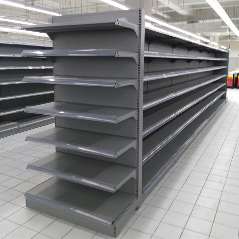 Rows of gray gondola shelving similar to what is found in retail stores.