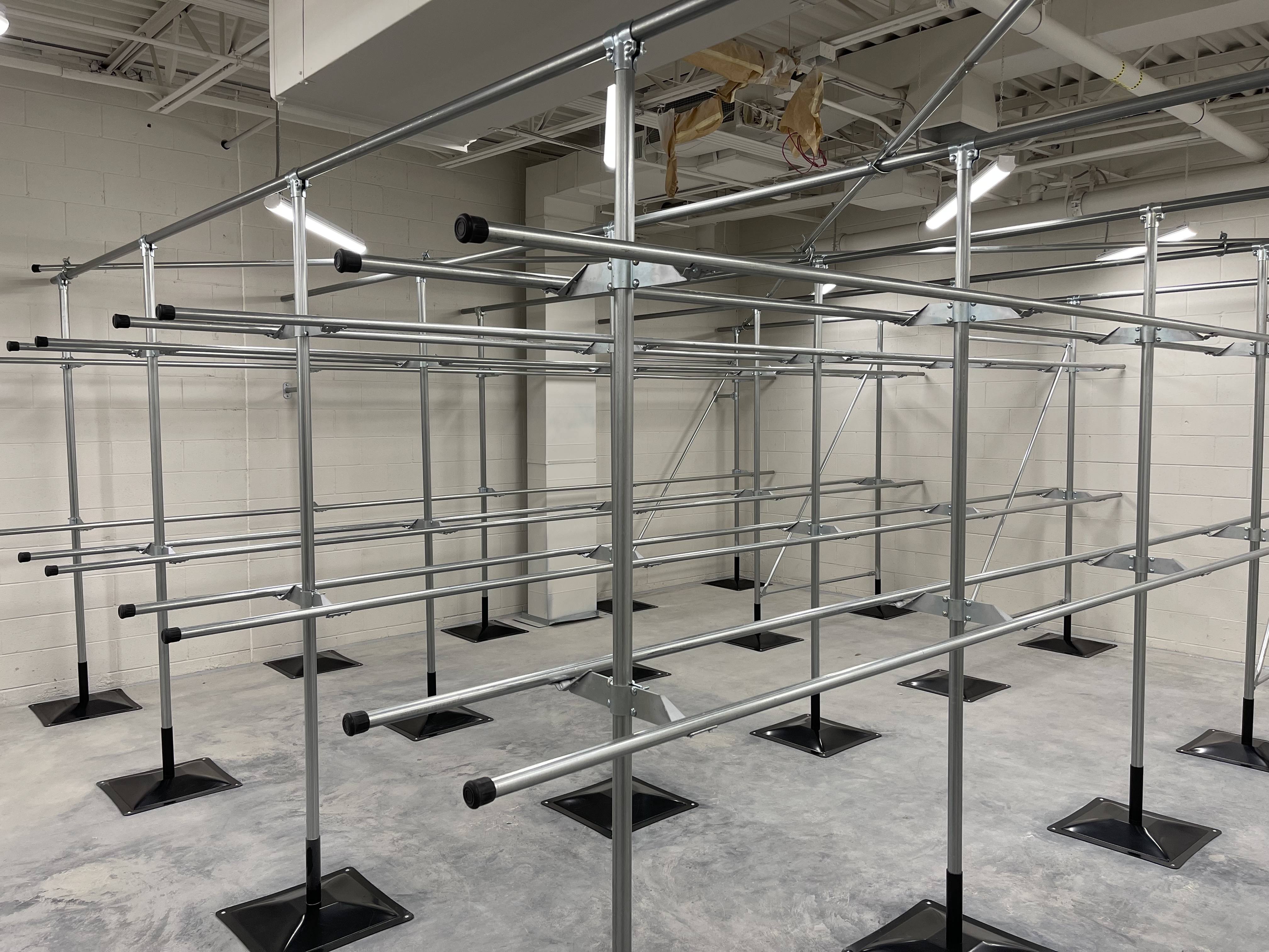 Several rows of metal bars designed for hanging items on.