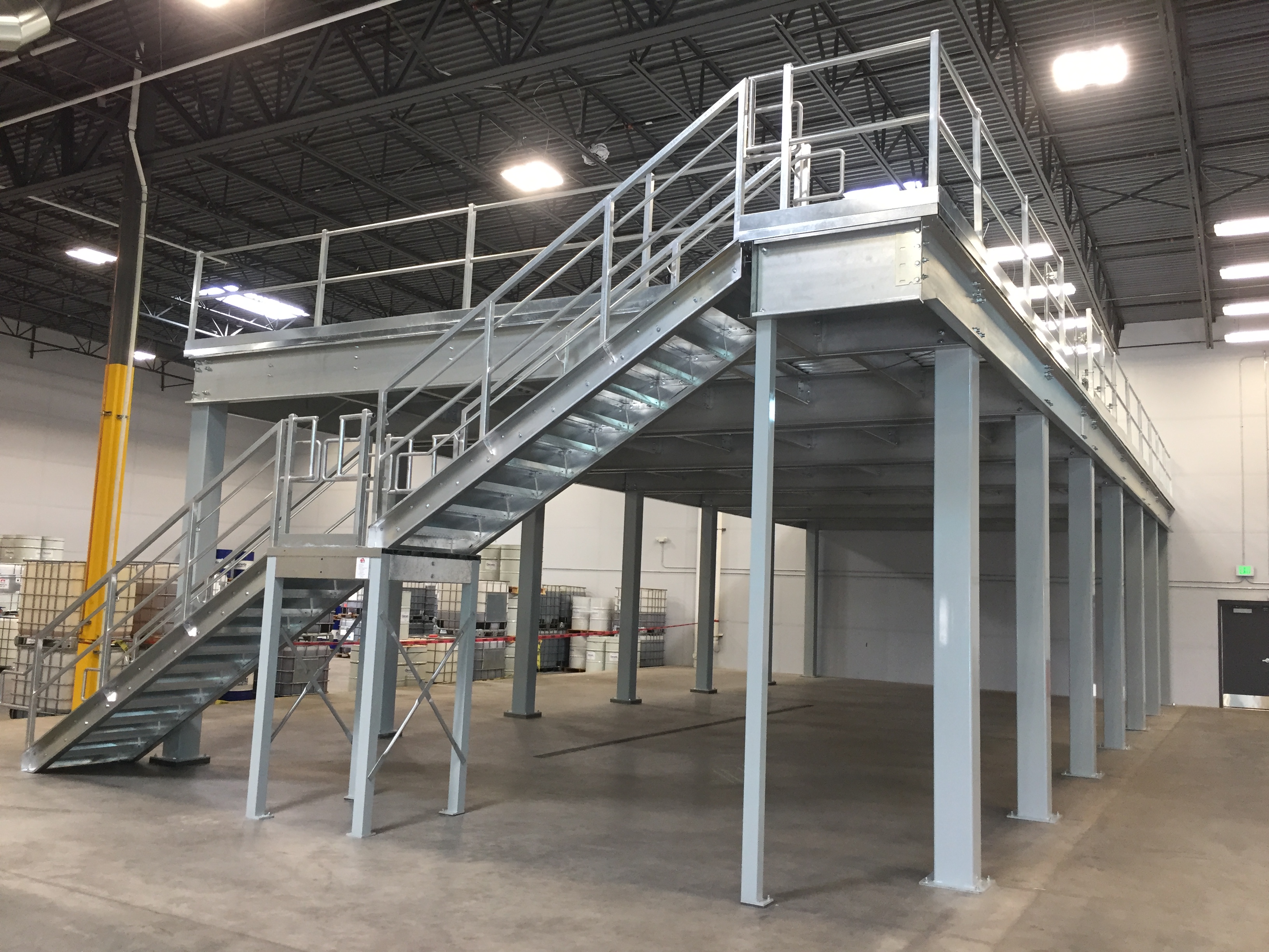 A tall mezzanine platform with a staircase on the side.